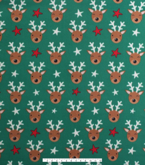 Reindeer on Green Blizzard Fleece Fabric - Image 2