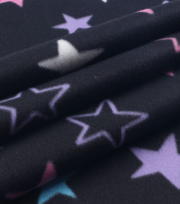 Stars on Black Blizzard Fleece Fabric - Image 3