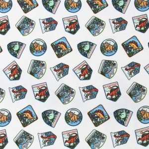 Dino Badges Super Snuggle Flannel Fabric