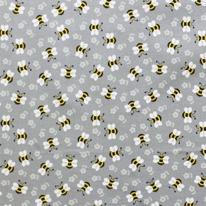 Tossed Bees On Gray Novelty Cotton Fabric