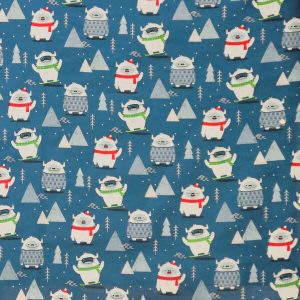 Yeti on Blue Novelty Christmas Cotton Fabric