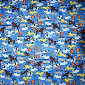 Dogs On Blue Novelty Cotton Fabric